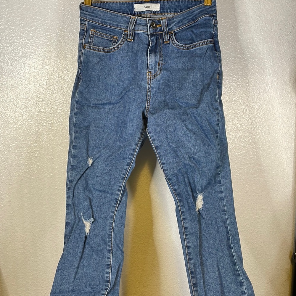 Vans medium washed skinny jeans.